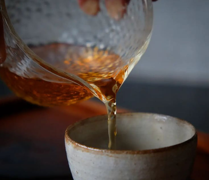 A dark infusion of black tea.